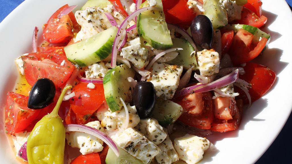 Xoriatiki · Our #1 Seller. Vine Tomatoes, Seedless Cucumbers, Red Onion, Peperoncini, Kalamata Olives and Dodoni Feta Cheese. Tossed in our Special Blend Extra Virgin Olive Oil and Seasoning.