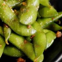 Spicy Edamame · Streamed organic young soybeans | homemade spicy chili hot oil.