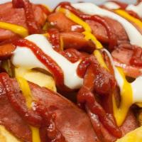 Salchipapa · Fries and sliced fried hot dog.
