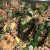 Chaufa Seafood · fried rice with shrimp, squid, mussels and shells.