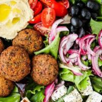 Vegan Falafel Bowl · Falafel balls come with Greek veggie salad and rice and pita bread and choice of sauce