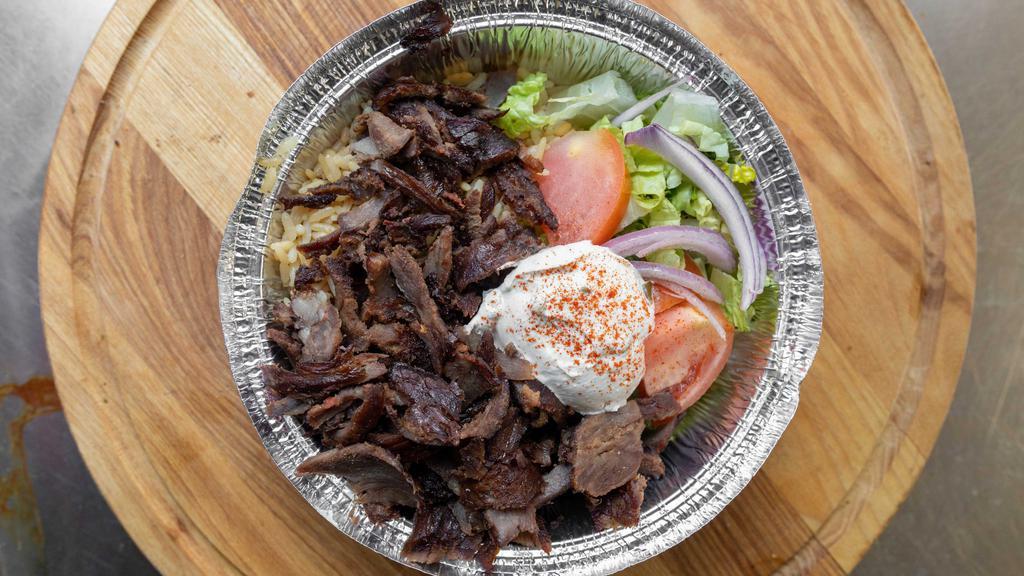 Beef & Lamb Gyro Bowl · Salad, rice, pita bread in a bowl, choice of sauce tzatziki This is authentic Beef & Lamb  blend Gyro meat