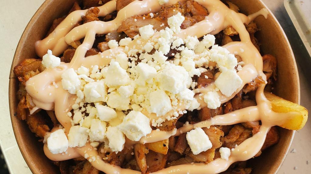Greek City Special  · Chicken gyro over Greek fries with home made pink sauce and sprinkled with feta and dollop of hummus