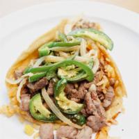 Plaza Taco · Each. Served on a soft tortilla with rice, sautéed jalapenos, onions and your choice of stea...