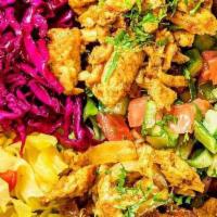 Chicken Shawarma Salad · Gluten free. Mixed lettuce and arugula, Israeli salad, red cabbage and Iraqi pickles. Gluten...