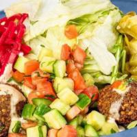 Falafel Salad · Vegan, gluten free. Mixed lettuce and arugula, red cabbage and Israeli pickles. Vegan. Glute...