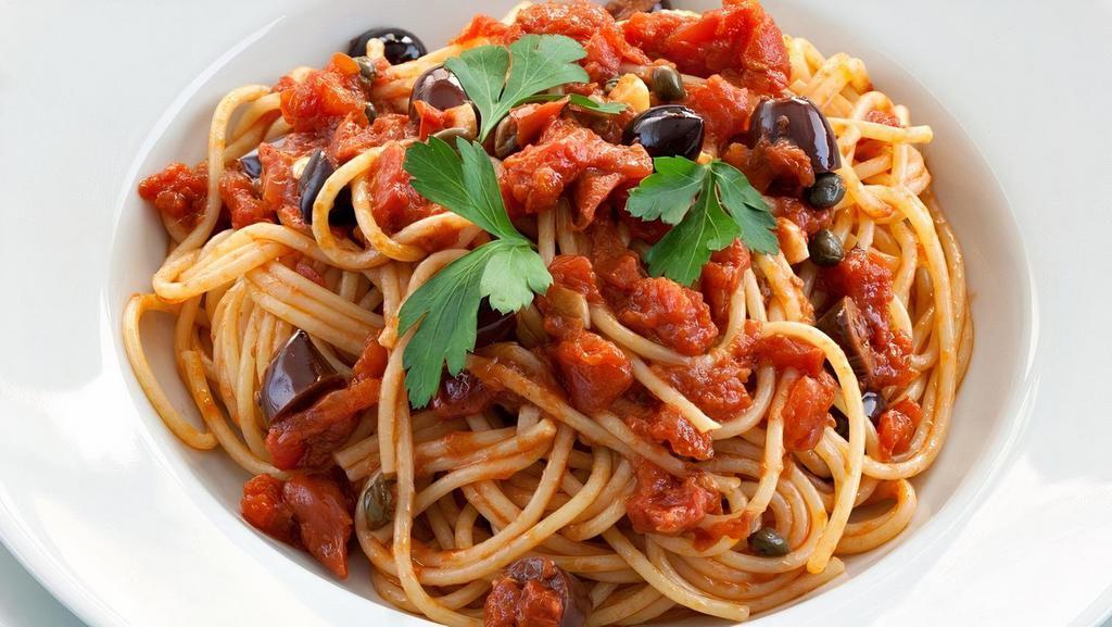 Puttanesca · Homemade tomato sauce, olives, capers, anchovies, carrots, Parmesan cheese. With choice of pasta. Served with fresh bread, choice of optional protein and vegetable add-on's.