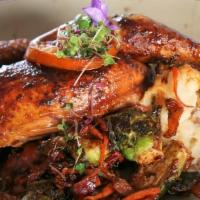 Brick Chicken · ½ bone-in free range chicken, homemade mashed potatoes, Brussels sprouts, smoked slab bacon,...