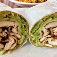 Pesto Wrap · Pesto grilled chicken, roasted peppers, provolone cheese, and lettuce with pesto sauce. Serv...