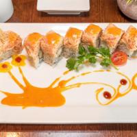 American Dream · Rock shrimp tempura inside, topped with spicy lobster and spicy kani served with spicy cream...