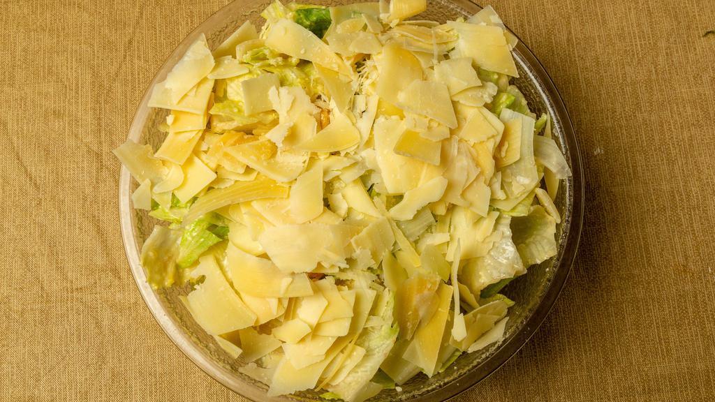 Caesar Salad · Romaine lettuce croutons and grated parmesan cheese in cesar dressing.