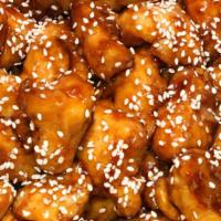 Sesame Chicken · Chicken dark meat chunks in house special sauce sauteed with sesame seeds on the top & brocc...