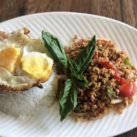 Krapraw Gai Sub · Minced chicken, chili, bell pepper, onion and basil leaves, topped with fried egg served wit...