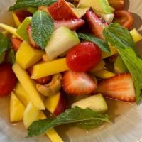 Summer Fruits Salad · Green apple, mango, strawberry, peach, cherry tomatoes, cashew nuts with Thai chili lime dre...