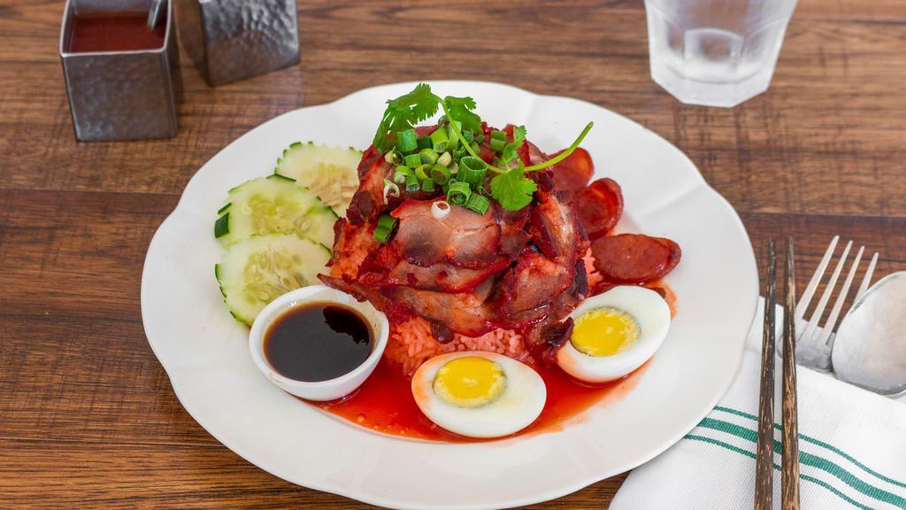 Kao Moo Dang · Roasted BBQ pork, Chinese sausage, hard-boiled egg, and cilantro with thick seasoned gravy over jasmine white rice.