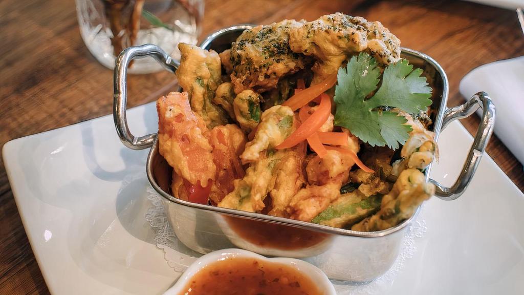 Puk Todd · Vegetarian. Mixed vegetable tempura. Assorted deep fried vegetables served with sweet chili sauce.