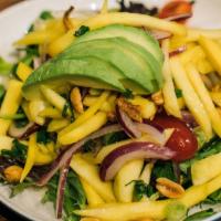 Mango Avocado Salad · Vegetarian, gluten-free. Mango, salad-avocado, crispy anchovies, crushed peanut, red onion a...