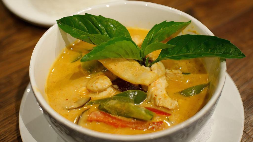 Red Curry · Gluten-free. Eggplant, bamboo shoots, bell pepper, and basil leaves, with coconut milk.