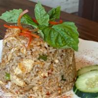 Basil Fried Rice · Onion, bell pepper, chili, basil leaves, and a fried egg mixed with rice.