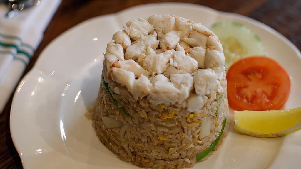 Crab Fried Rice · Crab meat, onion, scallion, and a fried egg, mixed with rice.