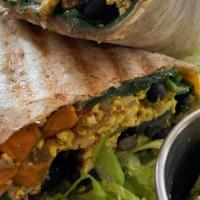 Breakfast Burrito · Seasoned tofu, Yukon potato, black beans, spinach, cheddar, pico de gallo, and avocado on a ...