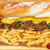 South Philly Cheesesteak · Original Philly steak, bell peppers, caramelized onions, cheese whiz French fries.
