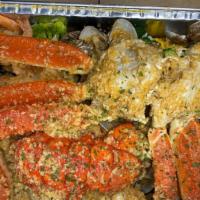 Party Tray. A · 1lb Snow Crab Legs 
1lb Shrimp Head Off 
1lb Green Mussels 
1lb Black Mussels 
1pc Lobster T...