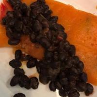 Pasteles · This family recipe has green plantain, eddoe (yautía), potato and tropical pumpkins wrapped ...