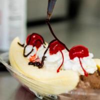Banana Split · 3 scoops of ice cream, banana, whipped cream, cherries, rainbow sprinkles, & hot fudge