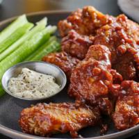 Honey Mustard Wings · Crispy and juicy chicken wings tossed in sweet and tangy Honey BBQ sauce.