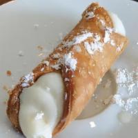 Cannoli · Crispy pastry shell filled with cannoli cream.