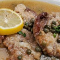 Veal Francese · Dipped in egg sautéed with olive oil, lemon and white wine. Served with pasta.