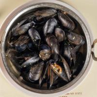 Mussels Mariniere · With garlic, parsley, and white wine broth.