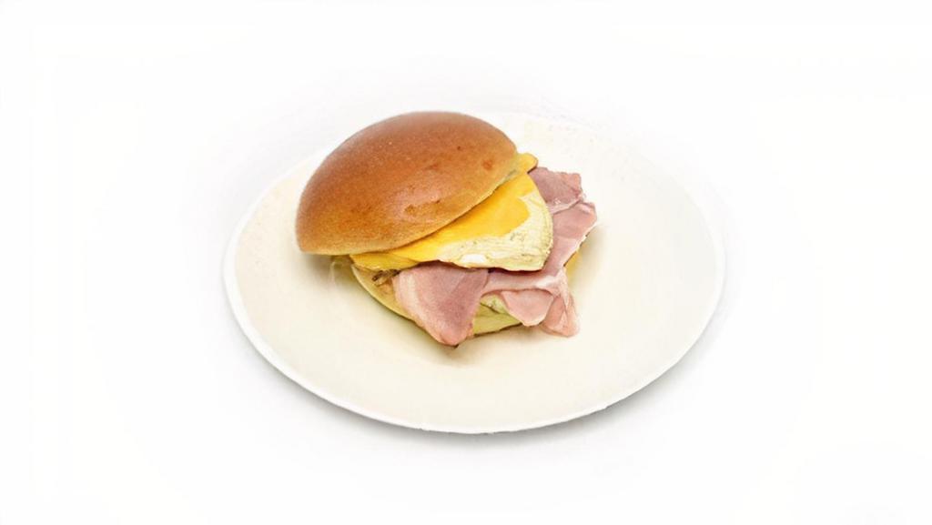 Ham, Egg & Cheez Sandwich · Scrambled Eggs with Carve Ham and American Cheese, on Brioche Roll; Ketchup packets