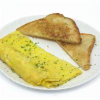 Cheez Omelette 🌿 · Vegetarian. Two eggs with shredded Cheddar on classic white, or toast on the side; ketchup p...