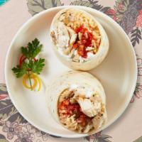 Chicken Burrito · Grilled chicken topped with sour cream, salsa, cheese, and spanish rice wrapped in a warm to...