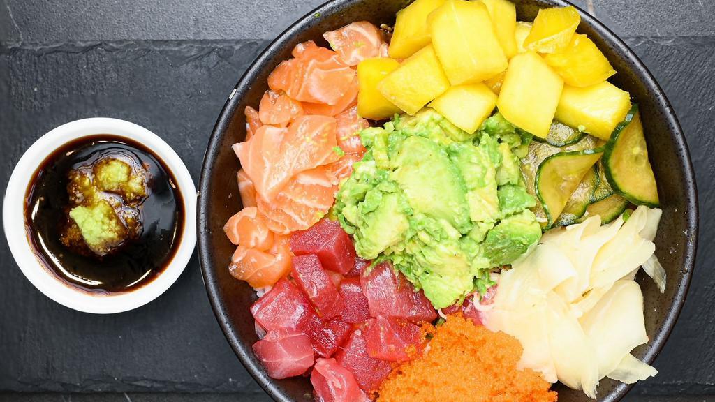 Wasabi Shoyu Bowl · Ahi Tuna, Salmon, Avocado, Mango, Tobiko, Pickled Cucumber, Roasted Seaweed topped with Ginger Wasabi Soy