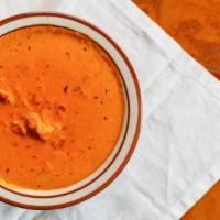Butter Chicken · Chicken cooked with spicy tomato and butter sauce.