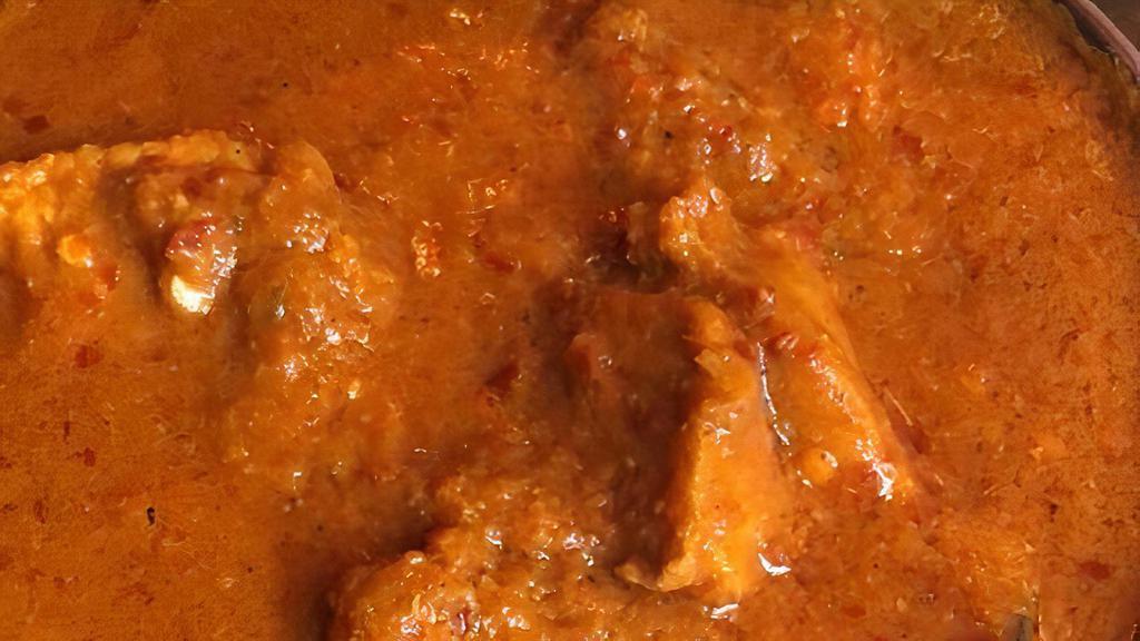 Chicken Vindaloo (Konkan Special) · Medium hot. Chicken and potato cooked with a sweet and sour sauce with a blend of vinegar, hot chilies and spices.