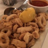 Fried Calamari · Simply fried, tomato sauce, lemon sea salt, parsley