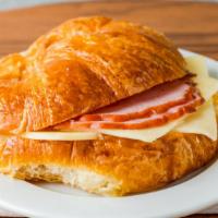 Ham & Cheese Croissant · House baked croissant, ham, cheddar cheese.