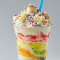 Tie-Dye Specialty Shake · Our fun-loving cake mix flavor blended with swirls of color then topped with whipped cream, ...