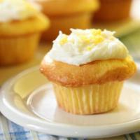 Lemon Icing Muffin · Fresh and moist muffin with lemon zest and icing.