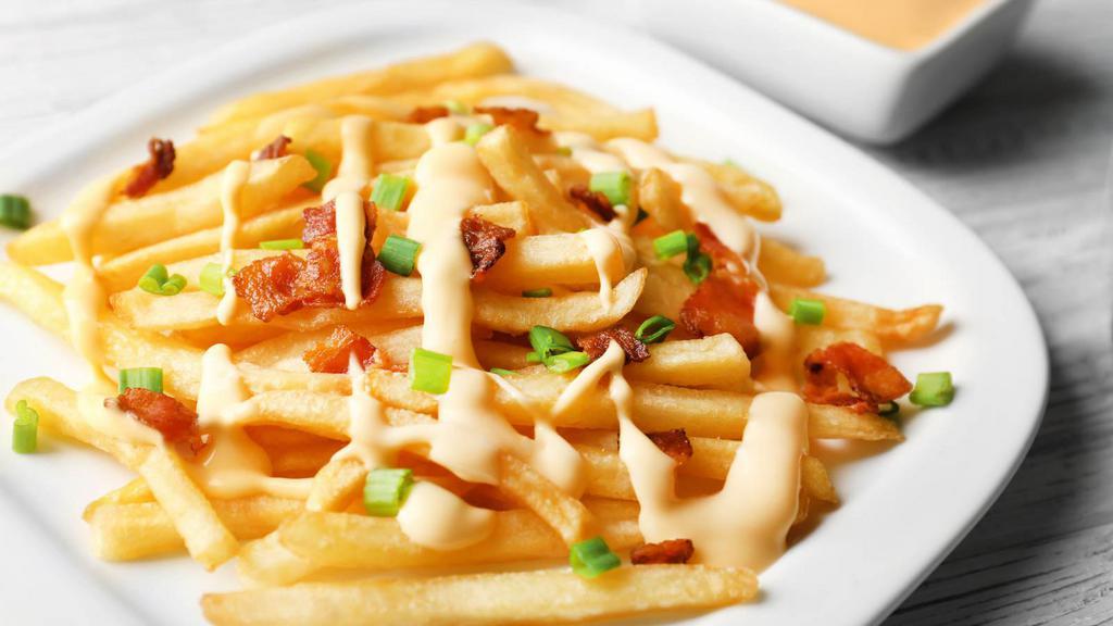Cheese Fries · Delicious and crispy cheese fries.