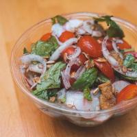 Baby Spinach Salad · Baby spinach with red onions, cherry tomatoes, radishes, sunflower and pumpkin seeds, pita c...