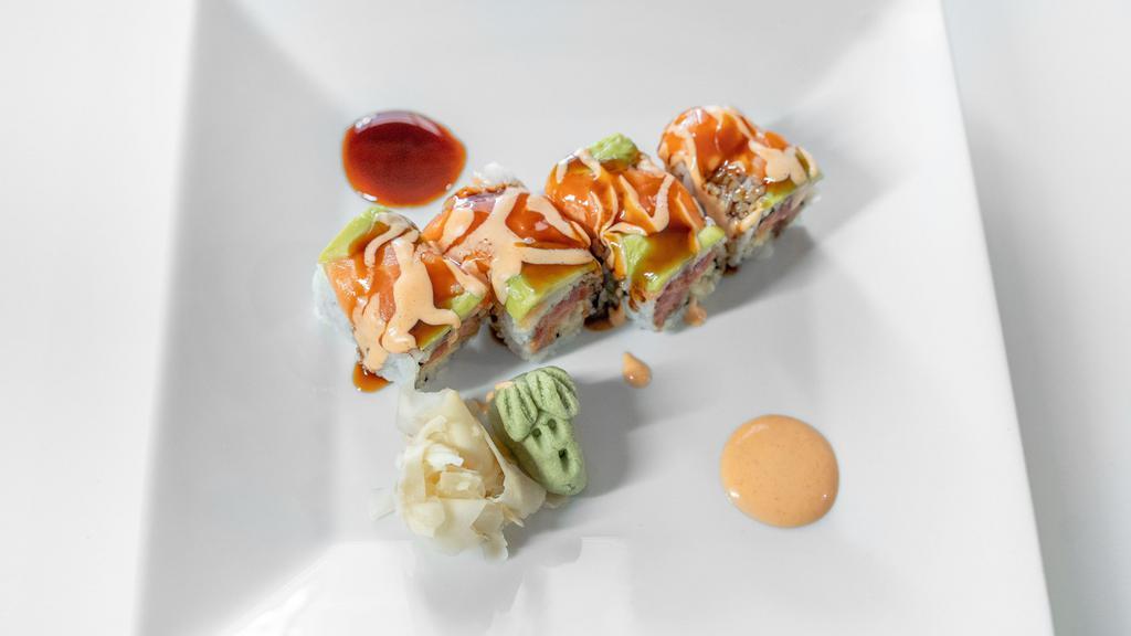 66 Oceanport Roll · Crunchy spicy tuna inside, salmon and avocado on top served with house spicy mayo sauce