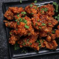 Original Soy Garlic Wings · Bell and evans wings fried in olive oil and brushed with soy and garlic sesame sauce for a b...