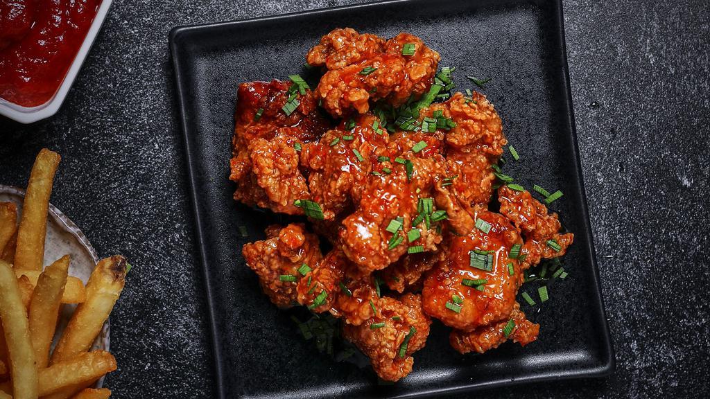 Thai Chili Boneless Wings · Bell and evans boneless chicken fried in olive oil and brushed with sweet and spicy glaze.