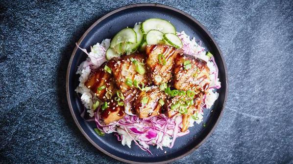Original Pork Belly Bowl · Thinly sliced decadent braised pork belly with pickled cucumbers, cabbage, sesame seeds, rice.