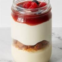 Mixed Berry Cheesecake Jar · New York style cheesecake, almond crumble, strawberry compote, fresh strawberries, blueberry...